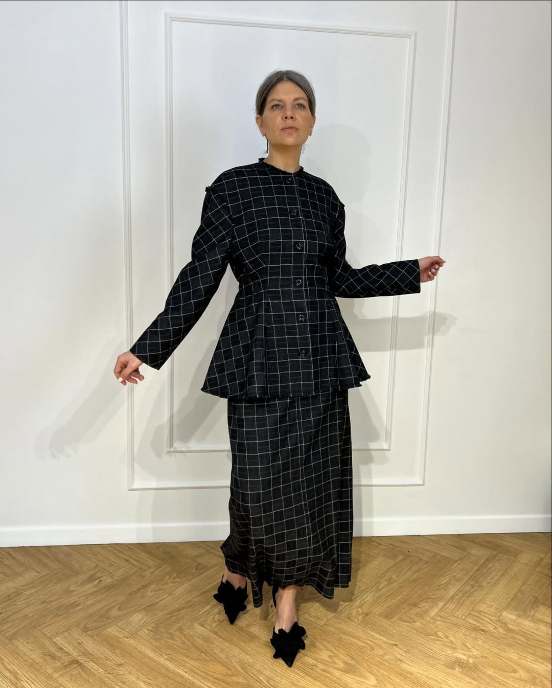 Пряма спідниця у клітинку