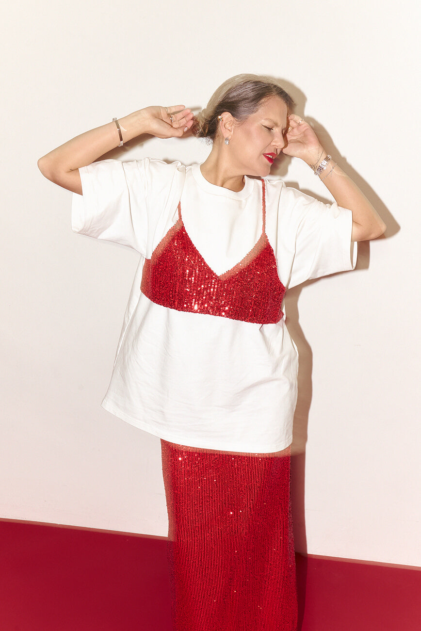 Біла футболка з ліфом в паєтках