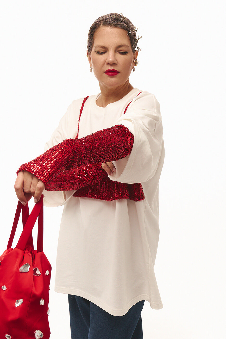 Біла футболка з ліфом в паєтках